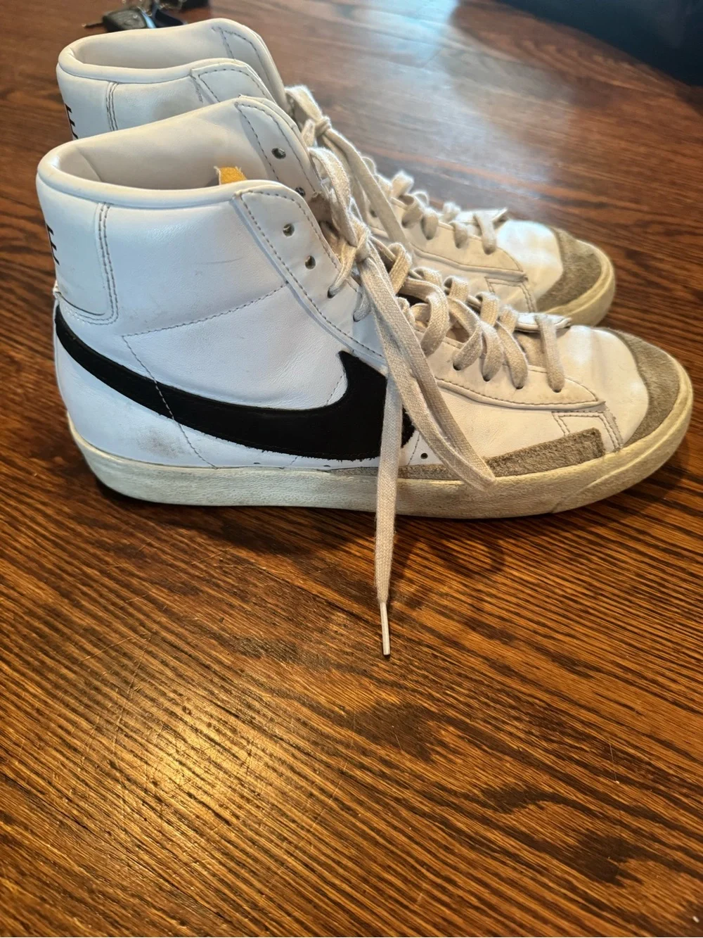 Nike Blazer White High-Top Sneakers with Black Swoosh Woman 11